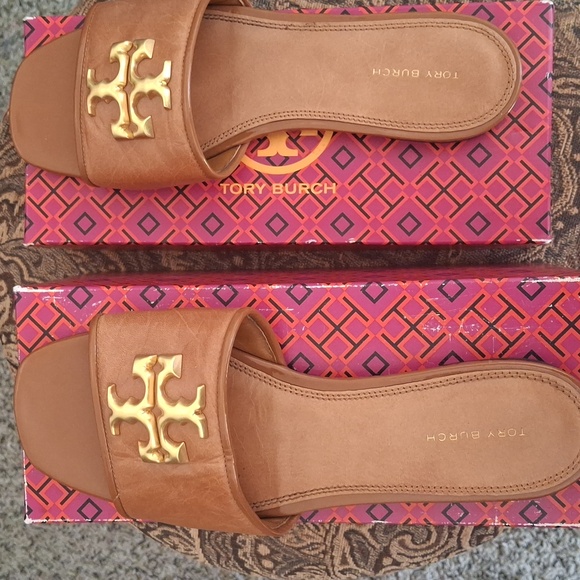 Tory Burch Shoes - Tory Burch Tan Slides with Gold Emblem